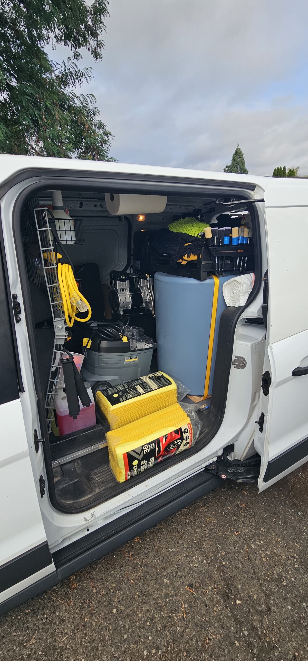 Van interior setup with water supply and generator